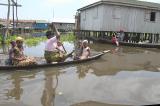 CRW_4561 Oct. 29, 2006 - Contonou, Benin - Stilt Village.  Heading home.